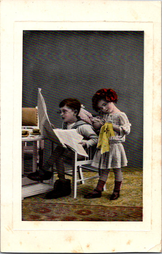 Vintage Postcard Man Reading Newspaper Woman Sewing Posted 1912 US One Cent